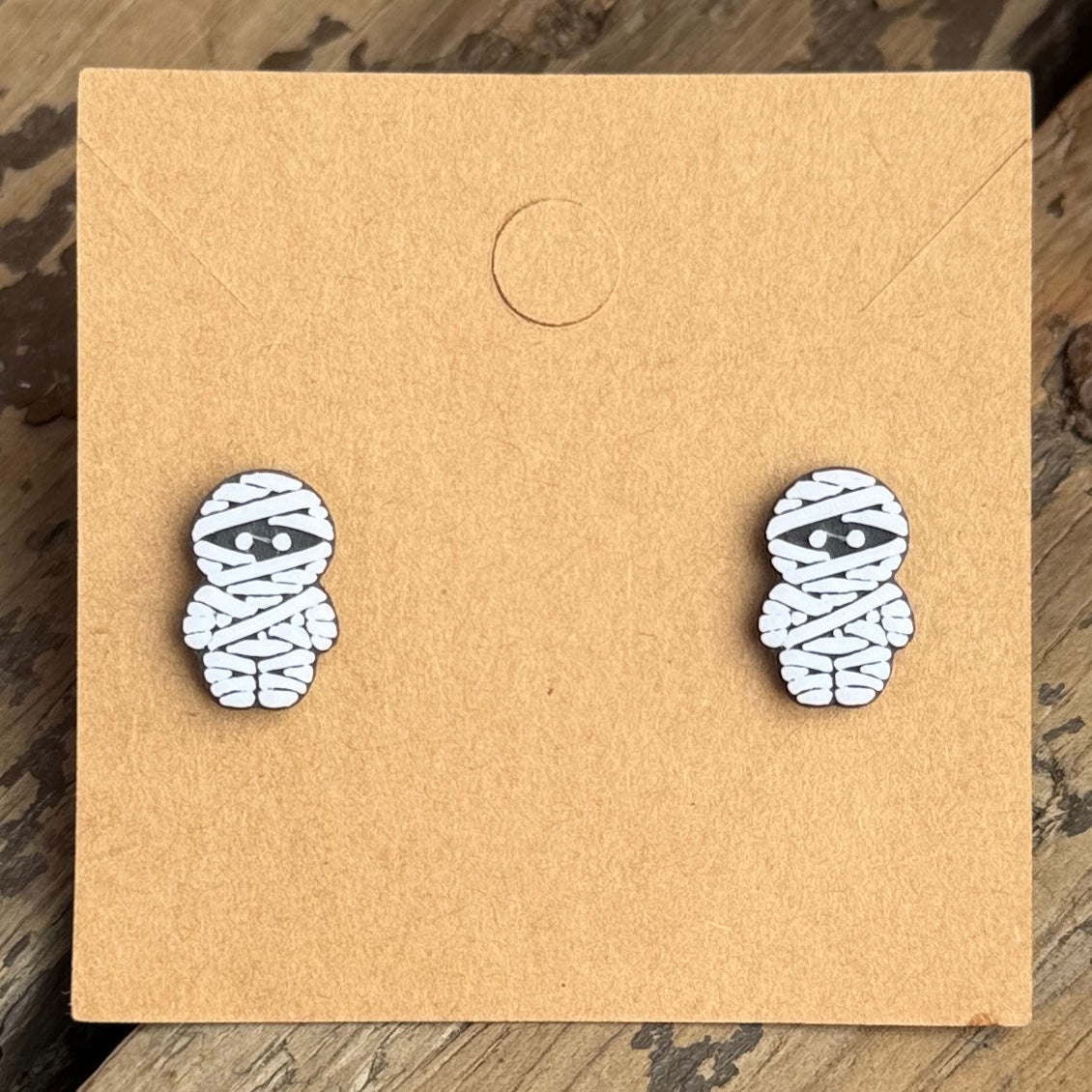 Mummy Halloween stud earrings close-up