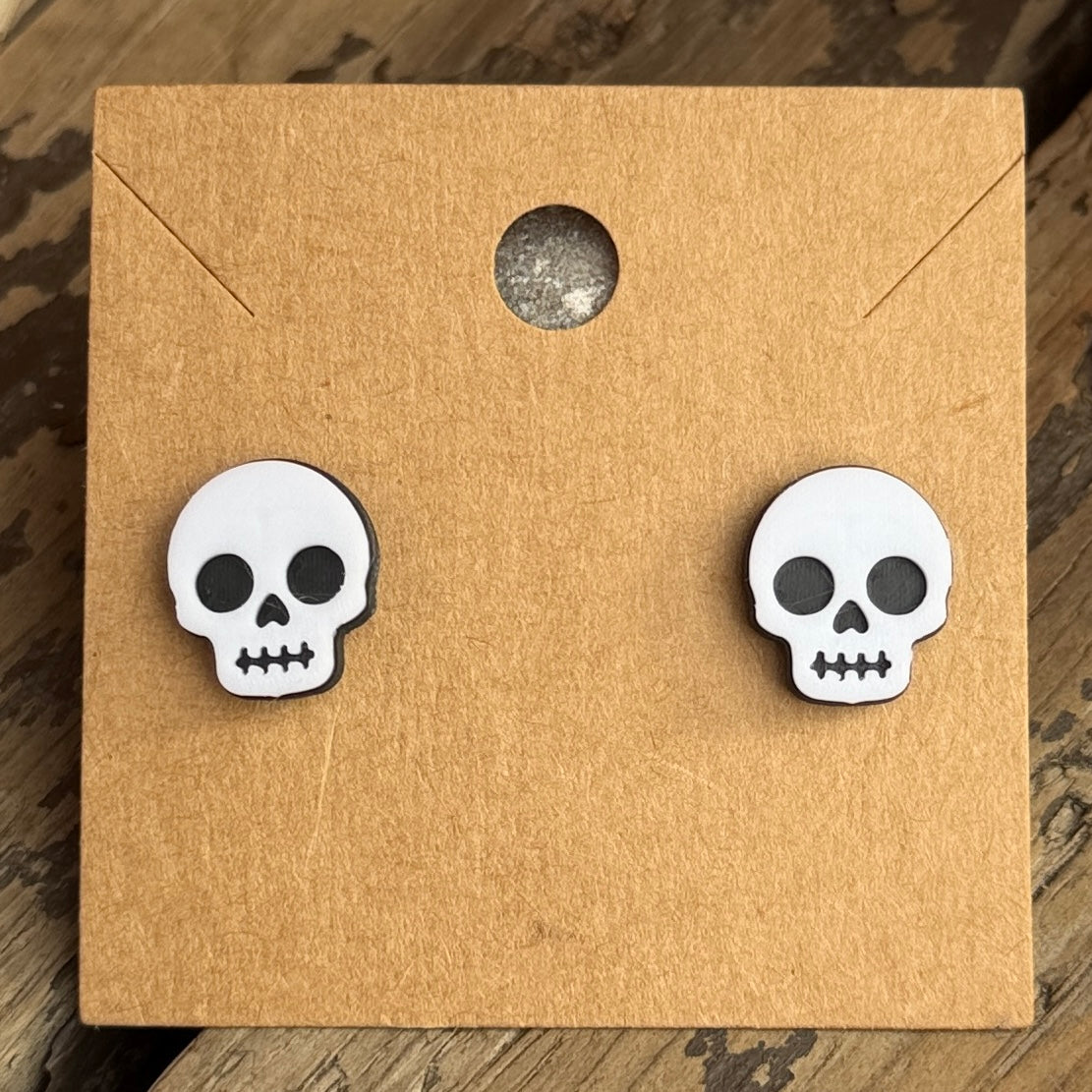 Skull Halloween stud earrings close-up