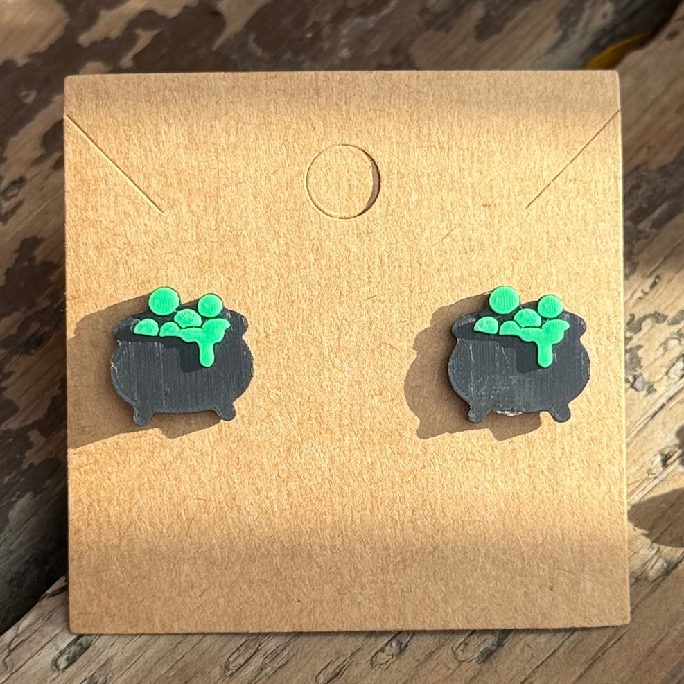 Cauldron Halloween stud earrings close-up