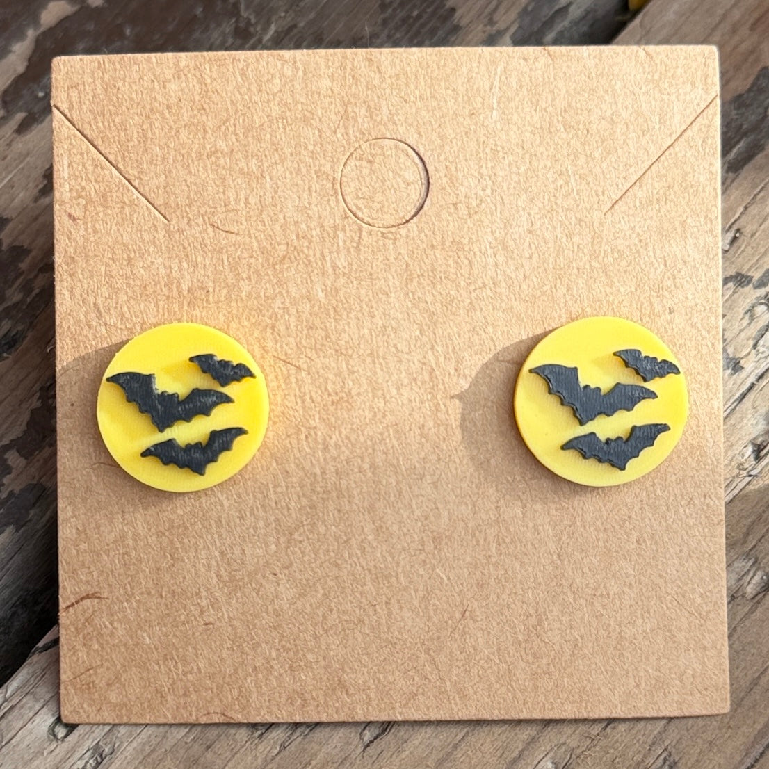 Bat full moon Halloween stud earrings close-up