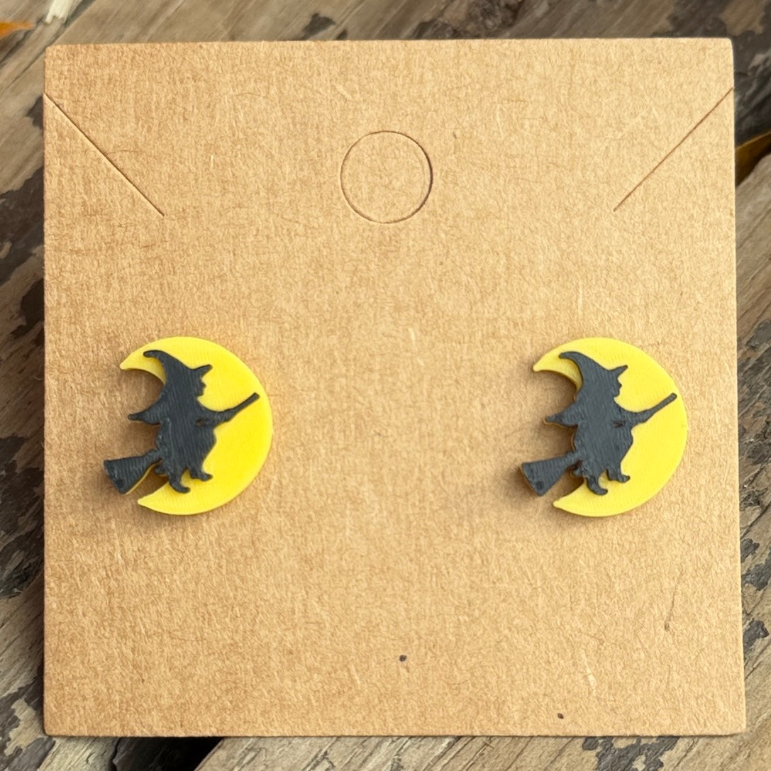 Flying witch moon Halloween stud earrings close-up