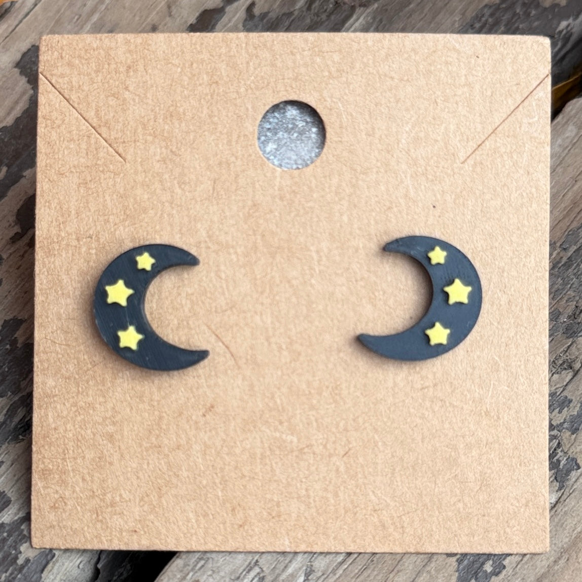 Starry moon Halloween stud earrings close-up