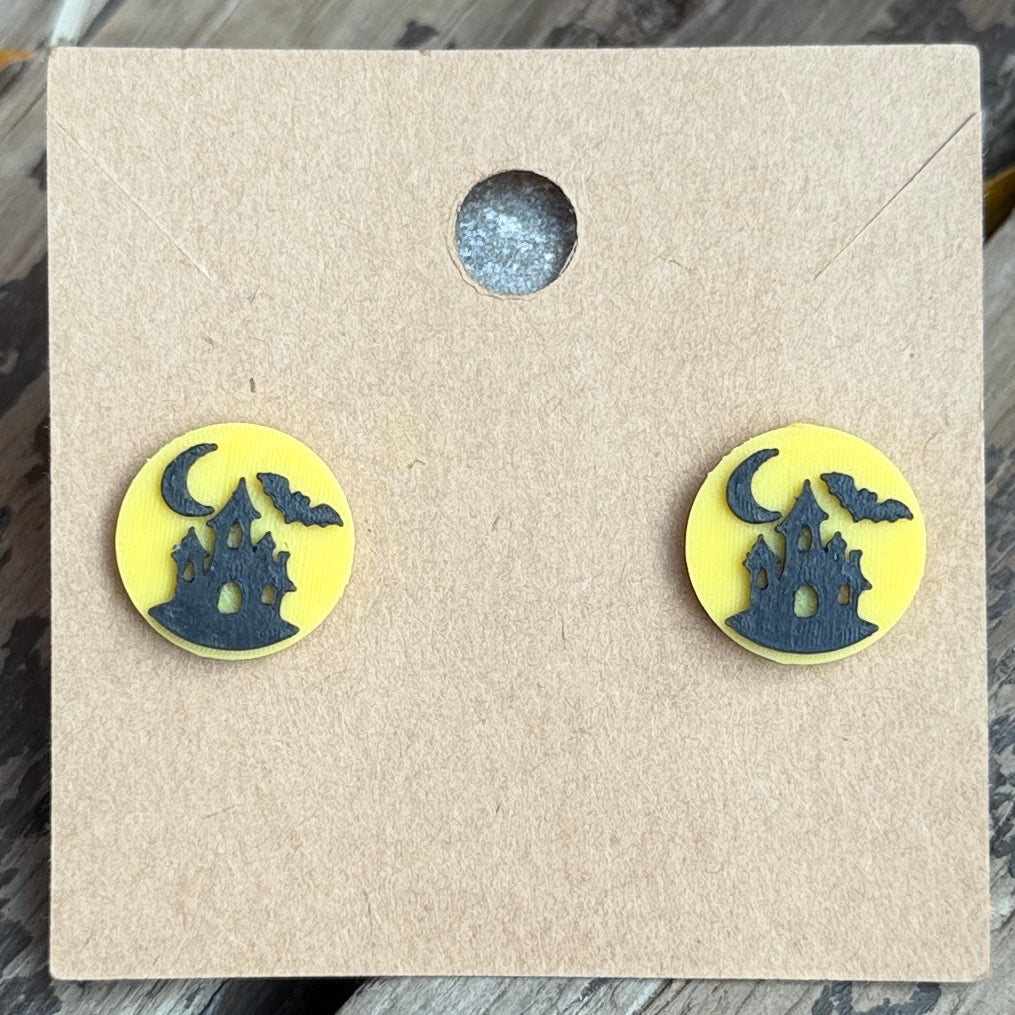 Haunted house Halloween stud earrings close-up