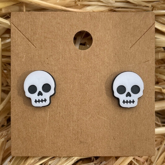 Skull Halloween stud earrings on kraft card