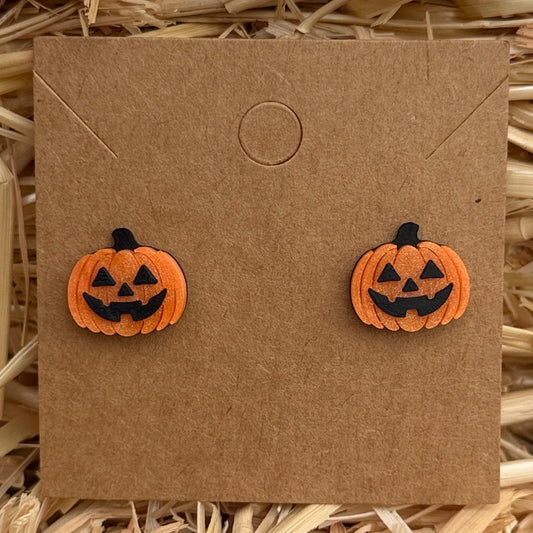 Jack-o-lantern Halloween stud earrings on kraft card