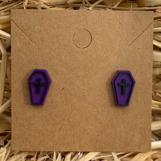 Purple coffin Halloween stud earrings on kraft card