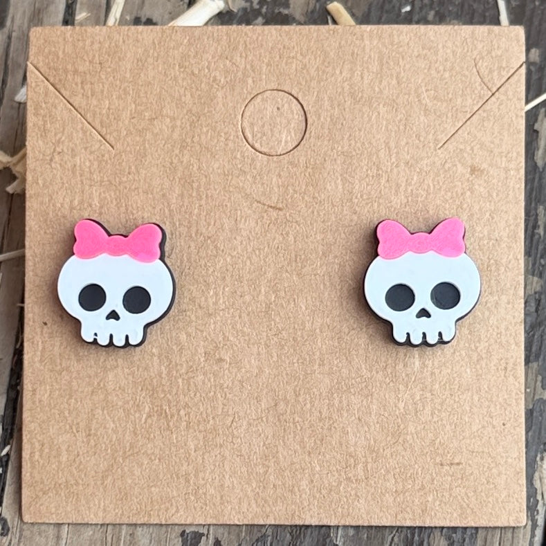 Pink Bow Skull Stud Earrings close-up