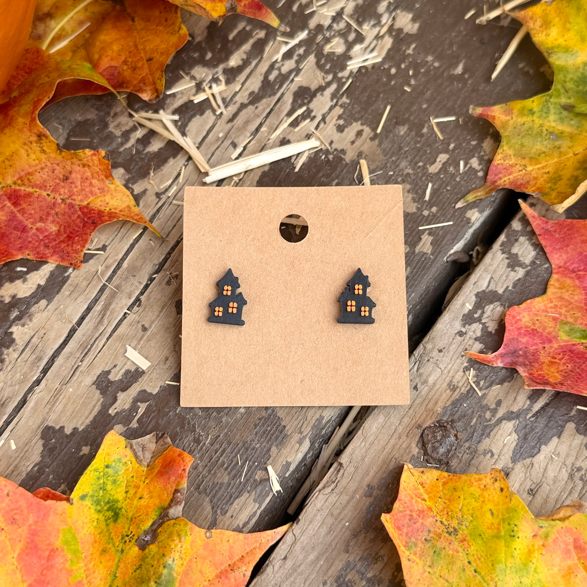Haunted House Stud Earrings on kraft earring card