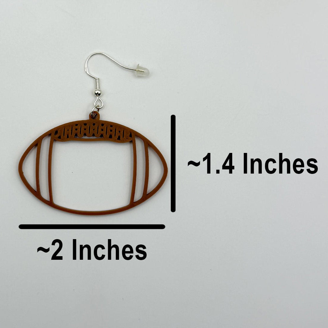Football earring shown with measurements of approximately 2 inches wide by 1.4 inches tall, excluding the hook.