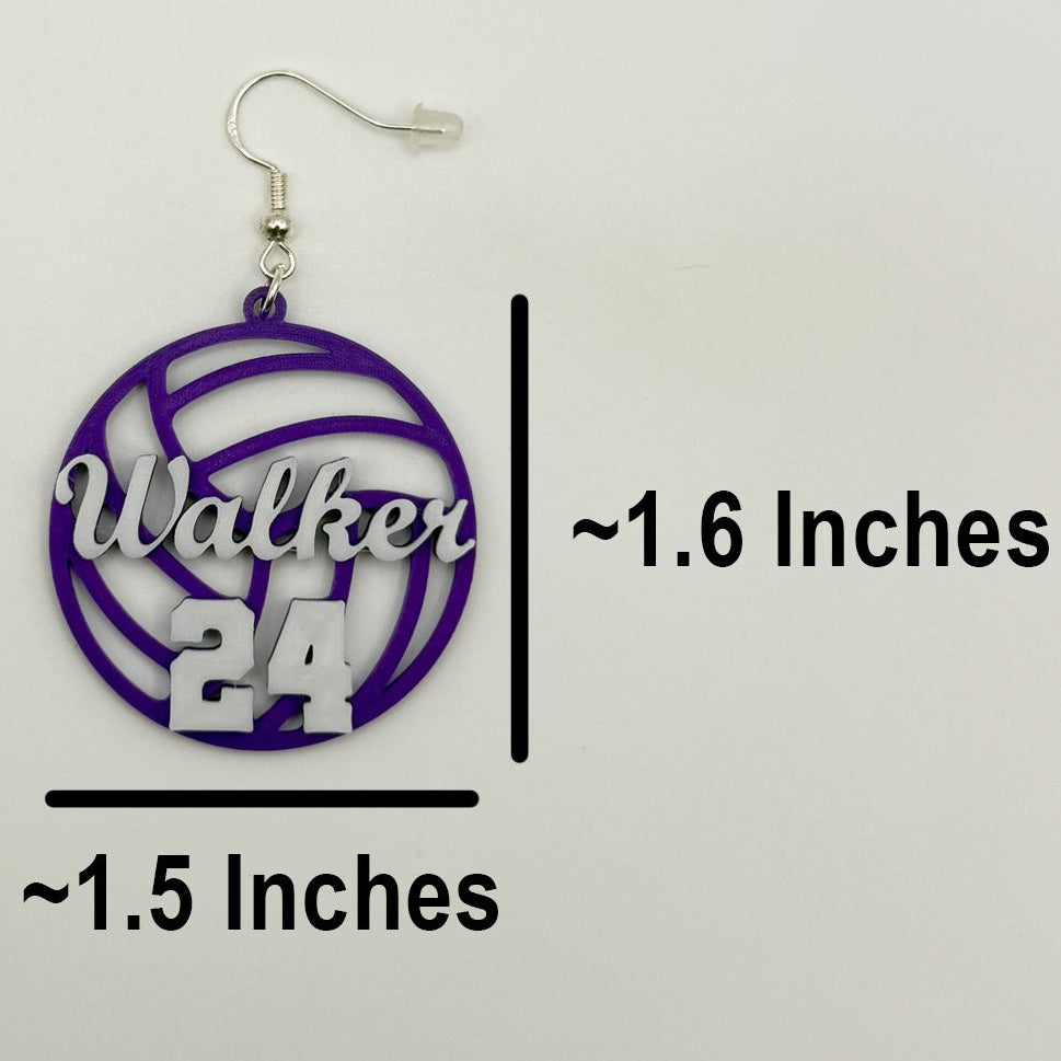 Personalized purple and white volleyball earring with Walker and number 24, measuring approximately 1.5 inches wide by 1.6 inches tall, excluding the hook.
